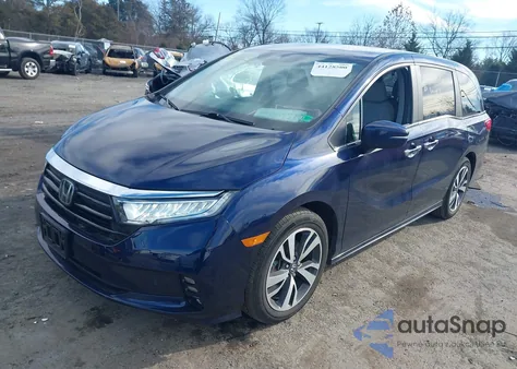 2022 Honda Odyssey Touring z USA, uszkodzony, nr VIN 5FNRL6H8XNB057584